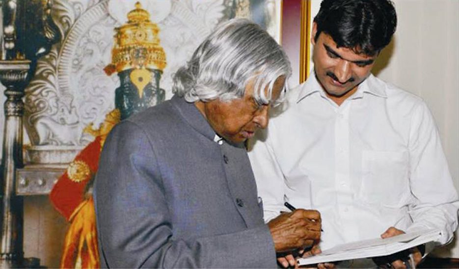 Santosh Talaghatti meeting a senior national dignitary